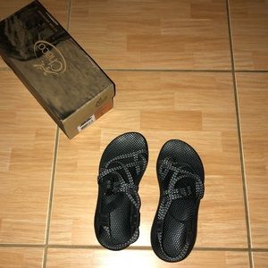 Black Chacos, has black/white strings